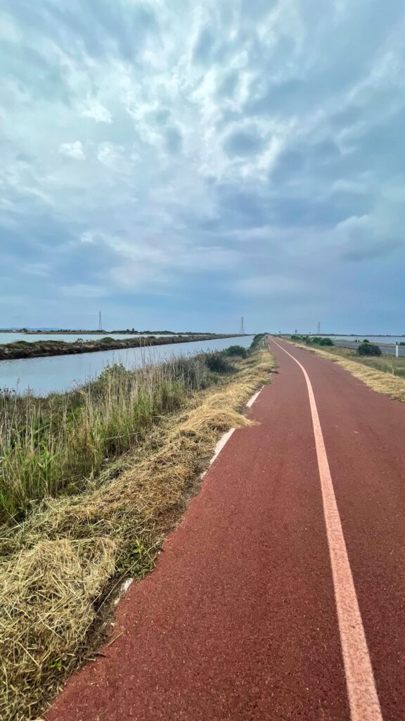 Bike path between the main island and Isola Sant'Antioco with some sea on the left